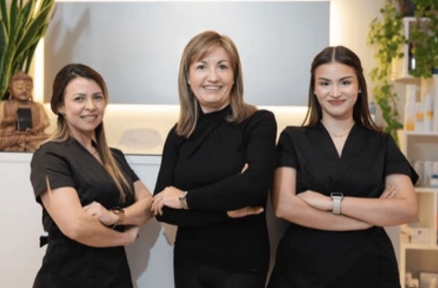 A thank-you photo of the clinic team with the patient's first name rendered into the image